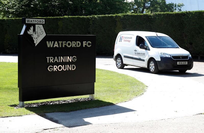 A Nationwide Pathology van leaves Watford Football Club training ground. Reuters