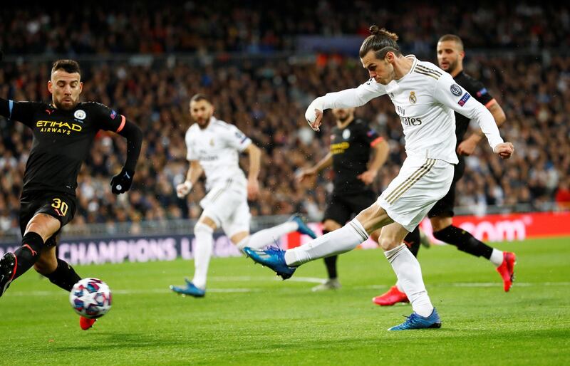 Gareth Bale takes a shot at goal against Manchester City. Reuters