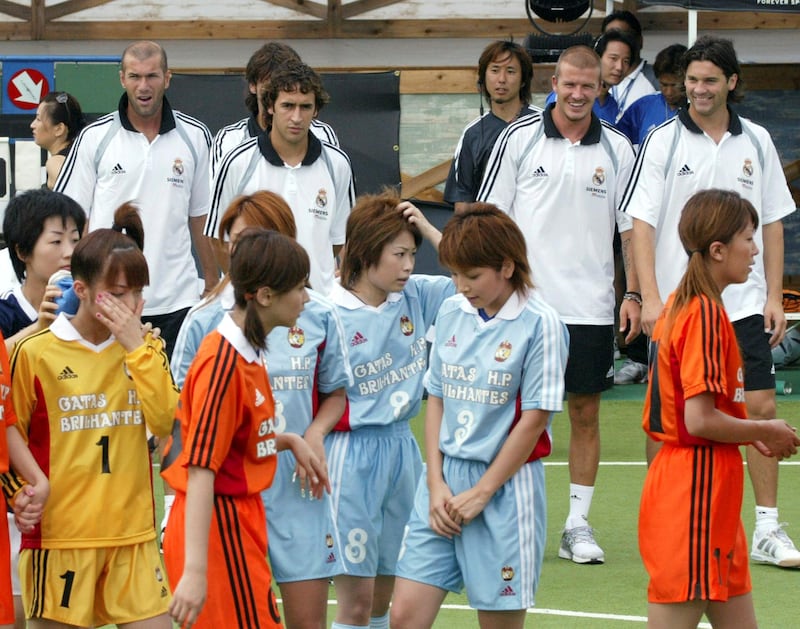 TOKYO - JULY 30: Real Madrid players (L-R) Zinedine Zidane, Raul David Beckham and Santiago Solari watch the players of an adidas sponsered Japanese girls five-a-side Futsal event on July 30, 2004 in Tokyo, Japan. (Photo by Koichi Kamoshida/Getty Images) 