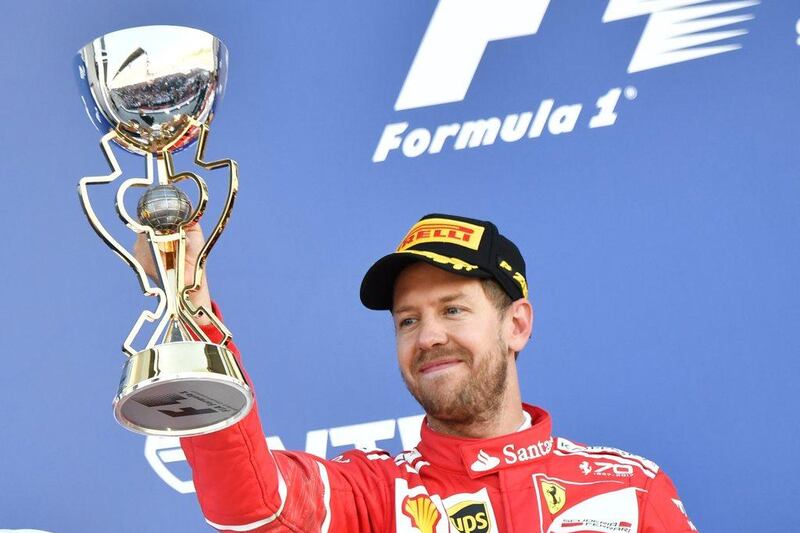 Sebastian Vettel celebrates his second place after the Formula One Russian Grand Prix at the Sochi Autodrom circuit in Sochi on April 30, 2017. Andrej Isakovic / AFP