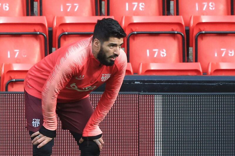 Barcelona striker Luis Suarez takes part in training at Anfield ahead of the Uefa Champions League semi-final, second leg against Liverpool. AFP