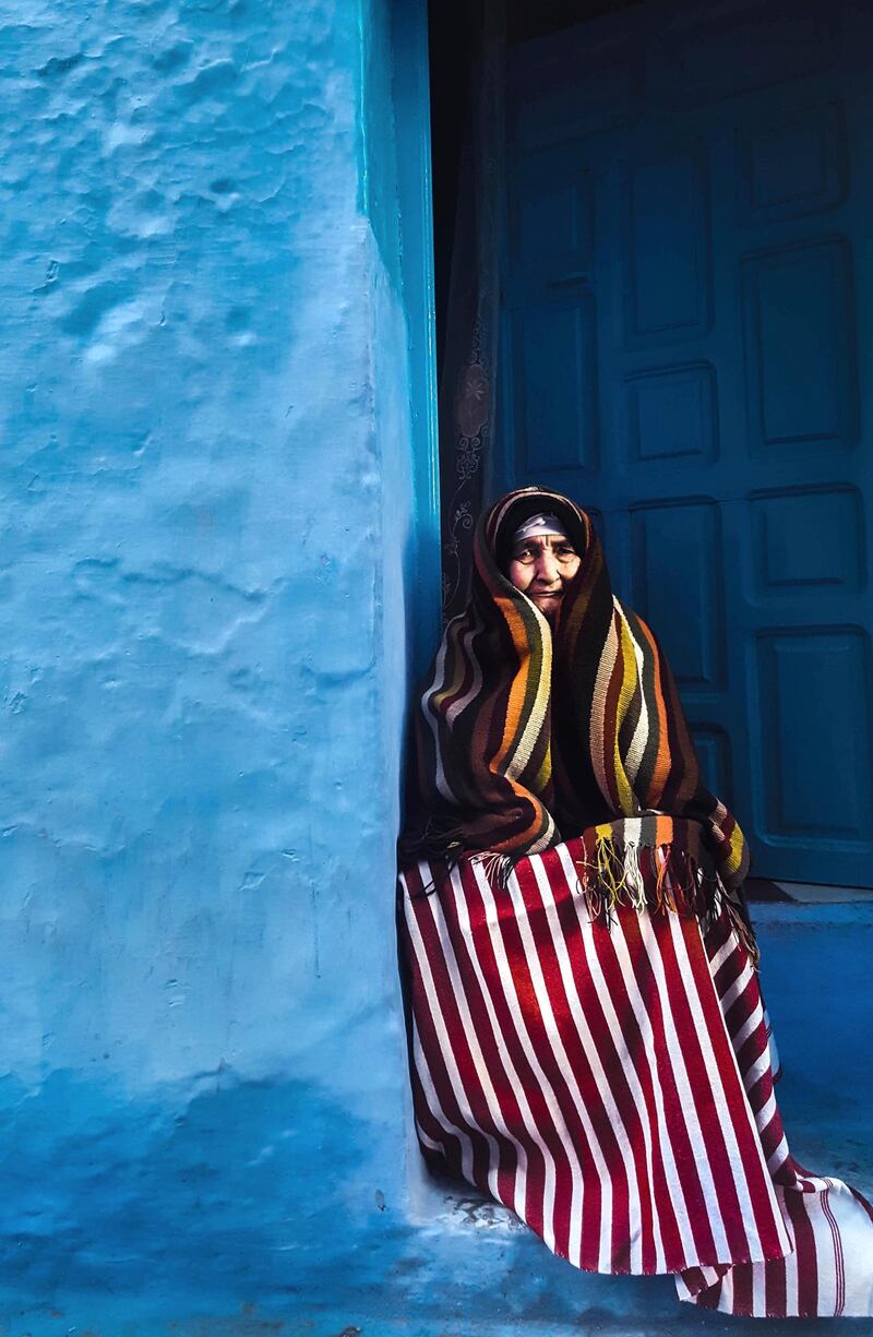 Soumaya Az, from Morocco, shed light on an elderly blind woman, nicknamed endearingly the “Blue Jewel”, in the Chefchaouen, Morocco region, who sits on her balcony every morning and spreads happiness and love throughout the neighborhood. Courtesy National Geographic Abu Dhabi