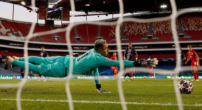 PSG goalkeeper Keylor Navas stretches to try and make a save. AP