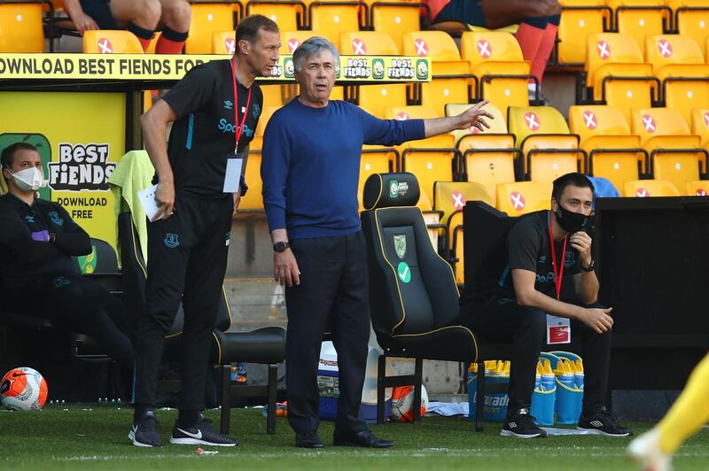 Everton manager Carlo Ancelotti makes a point to assistant coach Duncan Ferguson during his team's 1-0 at Norwich City on Wednesday, June 24. AFP