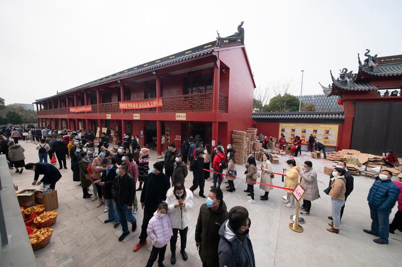 People wait in line to pray at a temple in Shanghai, China. Today marks the fifth day of Spring Festival celebrations in China. Getty Images