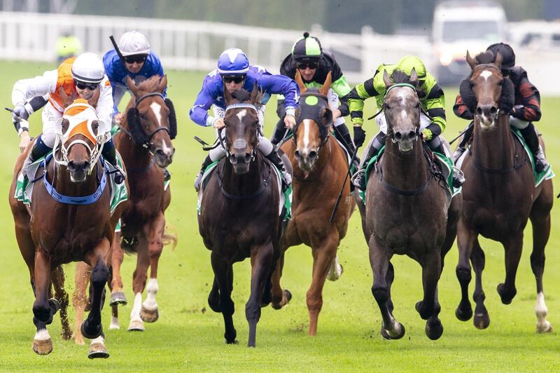 Winona Costin, in orange, guides Assault'n'Bathory to victory in The Tab Highway Handicap during Sydney Racing at Royal Randwick Racecourse on Saturday, January 11. Getty