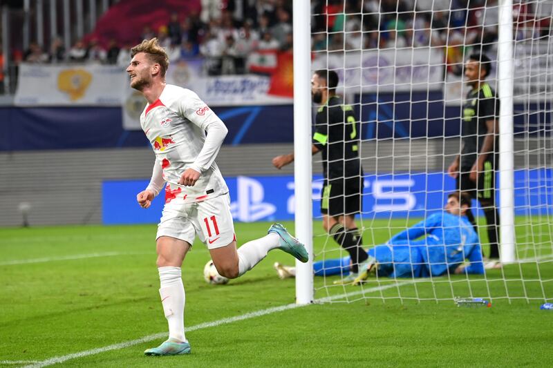 Timo Werner celebrates scoring RB Leipzig's third goal during the Uefa Champions League Group F match against Real Madrid at Red Bull Arena on October 25, 2022 in Leipzig, Germany. Getty