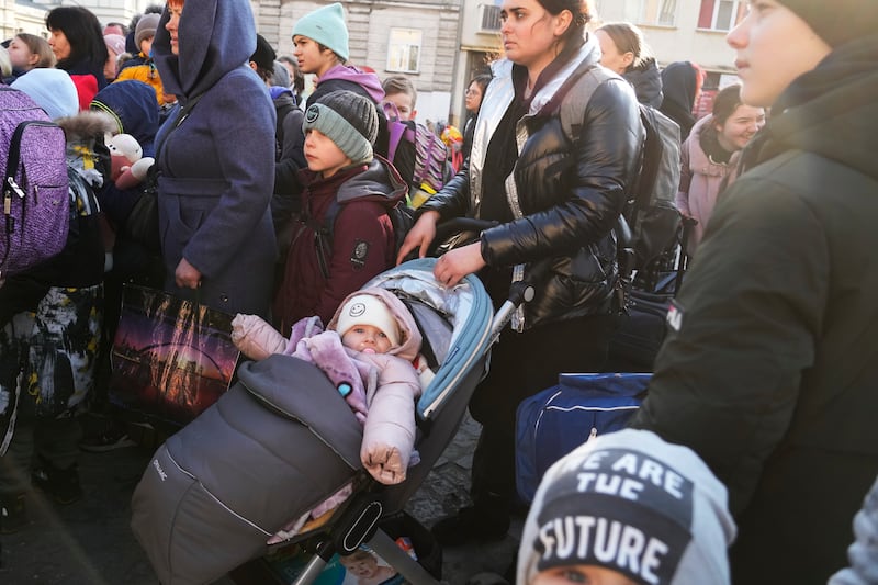 Refugees wait for transport at a railway station in Przemysl, Poland, after fleeing the war in neighbouring Ukraine. AP