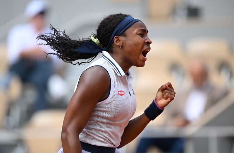 Coco Gauff celebrates a point against Ons Jabeur. Getty Images