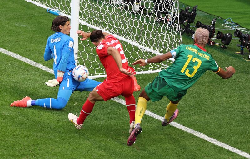 Switzerland goalkeeper Yann Sommer saves from Cameroon's Eric Maxim Choupo-Moting. Reuters