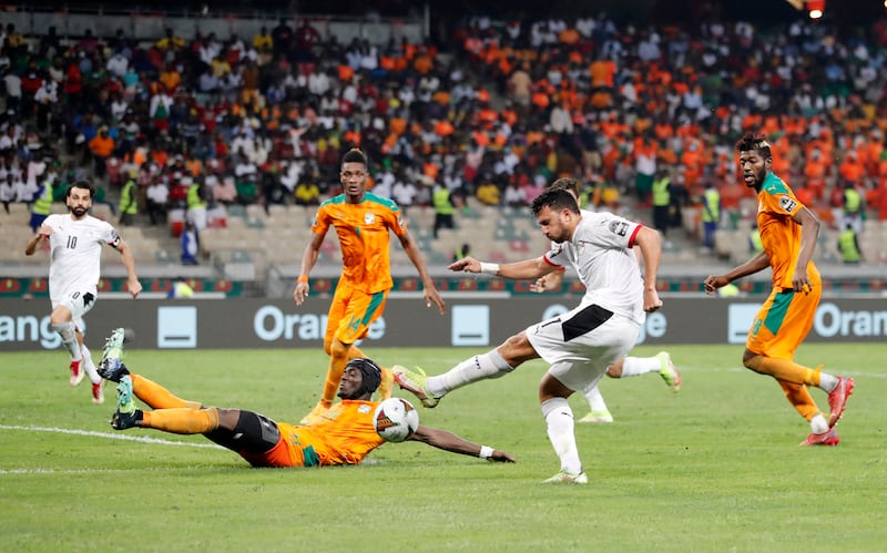Egypt's Mahmoud Hassan Trezeguet shoots at goal. Reuters