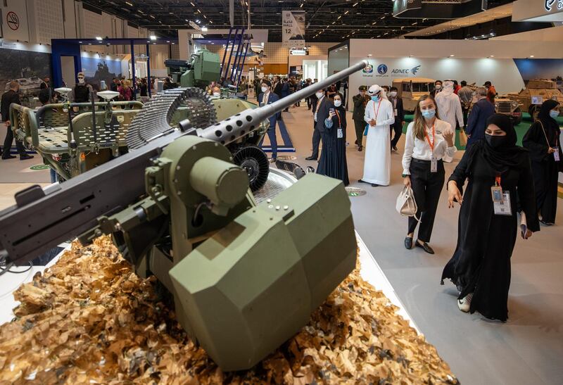Abu Dhabi, United Arab Emirates, February 24, 2021.  Idex 2021 Day 4.
 Visitors at the RCWS Remote Controlled Weapons Station located at the KOREA exhibition area in ADNEC.
Victor Besa / The National
Section:  NA