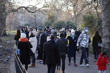 People walk in a park in central London amid the UK's third national lockdown. AFP 