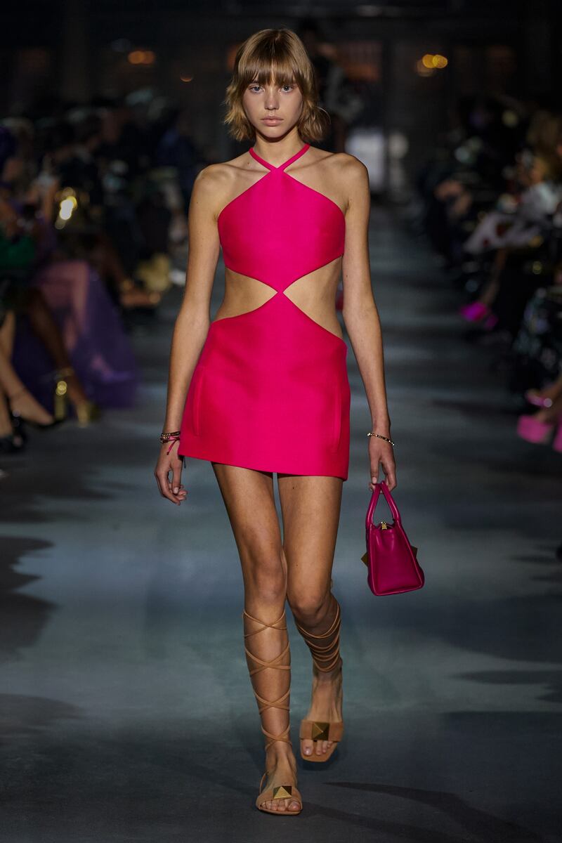 A pink halter cutout dress from the Valentino spring/summer 2022 show
