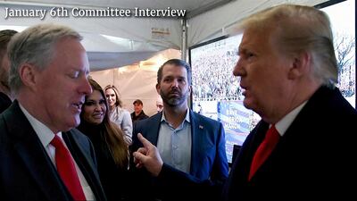 Former US President Donald Trump talks to his chief of staff Mark Meadows before Mr Trump spoke at the rally on Jan 6. House Select Committee via AP
