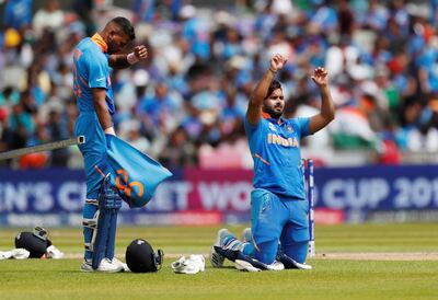Cricket - ICC Cricket World Cup Semi Final - India v New Zealand - Old Trafford, Manchester, Britain - July 10, 2019   India's Hardik Pandya and Rishabh Pant during the match    Action Images via Reuters/Lee Smith