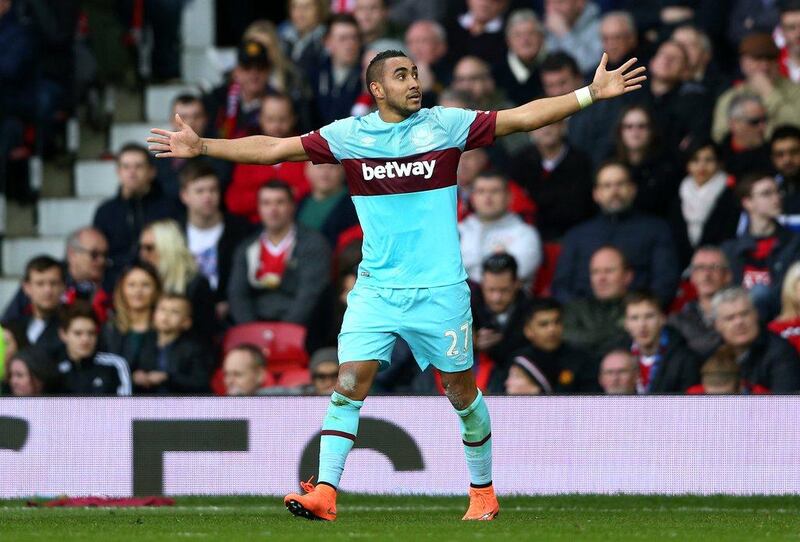 Dimitri Payet of West Ham United celebrates as he scores their first goal from a free kick during the Emirates FA Cup sixth round match between Manchester United and West Ham United at Old Trafford on March 13, 2016 in Manchester, England. (Photo by Clive Brunskill/Getty Images) 