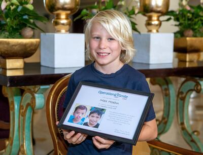 Abu Dhabi, United Arab Emirates, March 9, 2021.  Maximillian Hoehn 10 year old raises Dh11,000 for UAE charity, Operation Smile. Max with an appreciation plaque from Operation Smile UAE.
Victor Besa/The National
Section:  NA
Reporter:  Sarwat Nasir