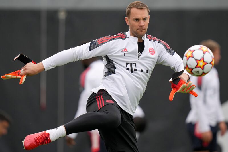 Bayern goalkeeper Manuel Neuer kicks the ball. AP Photo / Matthias Schrader