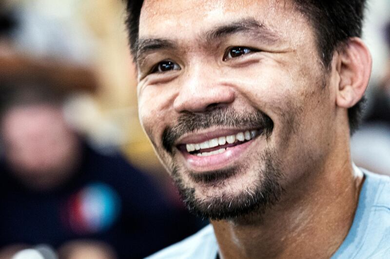 Manny Pacquiao is all smiles as his works out in front of the media. EPA