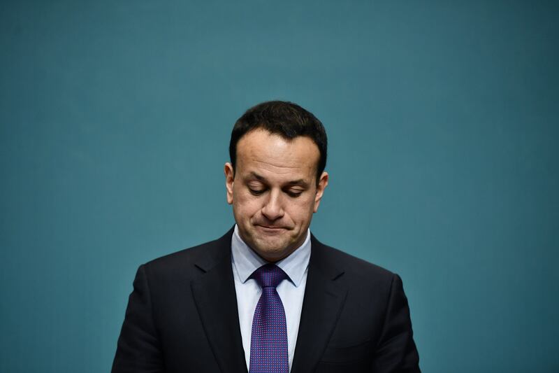 Mr Varadkar looks down during a press conference with EU chief Brexit negotiator Michel Barnier in Dublin in April 2019. Getty Images