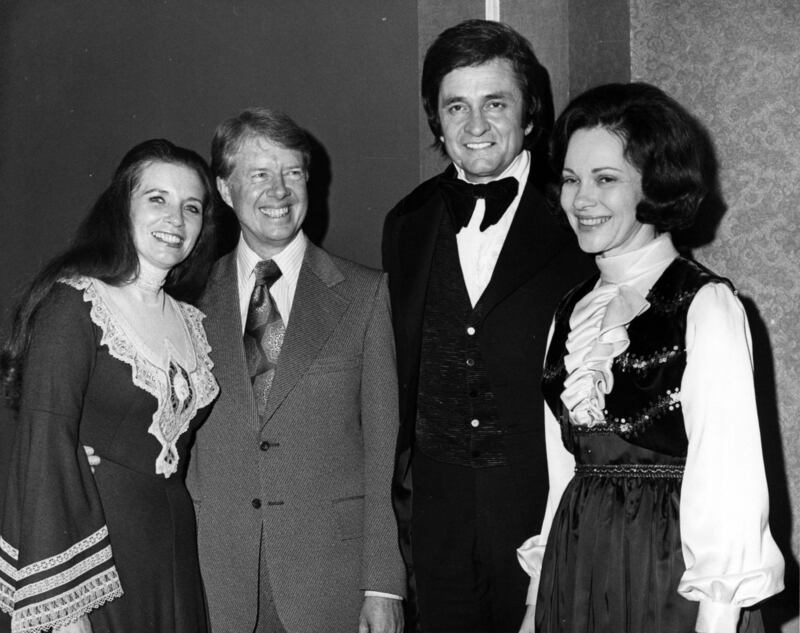 The Carters with Johnny and June Carter Cash, Mr Carter's cousin.
