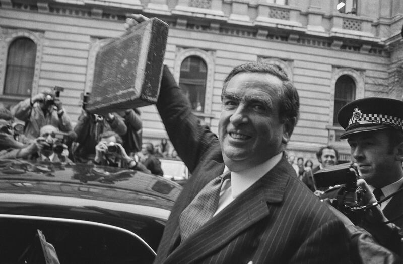 Labour chancellor Denis Healey leaves Downing Street for the House of Commons with his budget box in 1974
