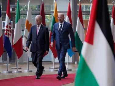Palestinian Prime Minister Mohammad Mustafa (L) and President of the European Council Charles Michel (R) arrive for their meeting at the EU headquarters in Brussels on May 26, 2024.  (Photo by Simon Wohlfahrt  /  AFP)