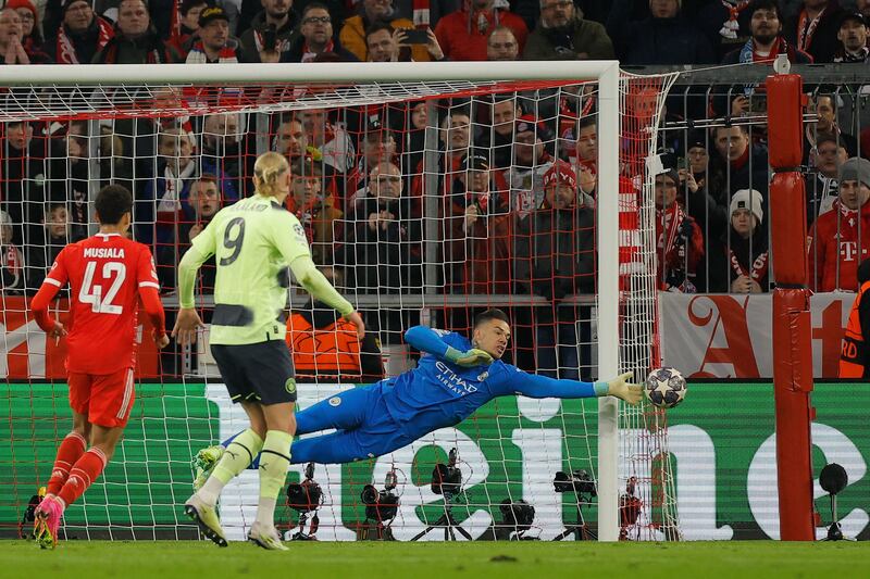 Manchester City goalkeeper Ederson saves a free kick. AFP