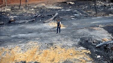 A worker at the scene of a fire that destroyed Al Ahram Studio in Cairo. Reuters