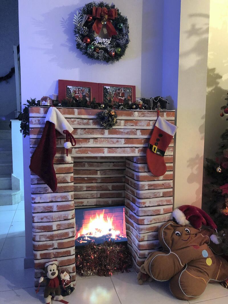 A hand-made cardboard box by Jeanette Lanopa-Buley, complete with a roaring 'digital' fire. Courtesy Jeanette Lanopa-Buley