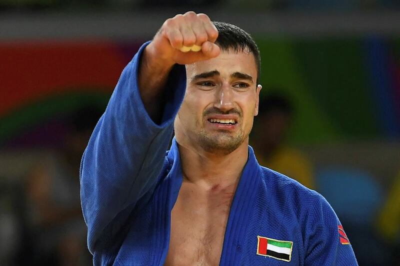 Sergiu Toma celebrates after defeating Italy's Matteo Marconcini during their men's -81kg judo contest bronze medal match. Toshifumi Kitamura / AFP