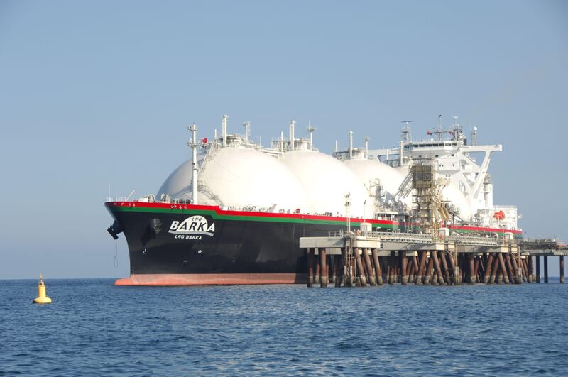 An LNG vessel at a jetty in the Omani port city of Sur. Photo: Oman LNG