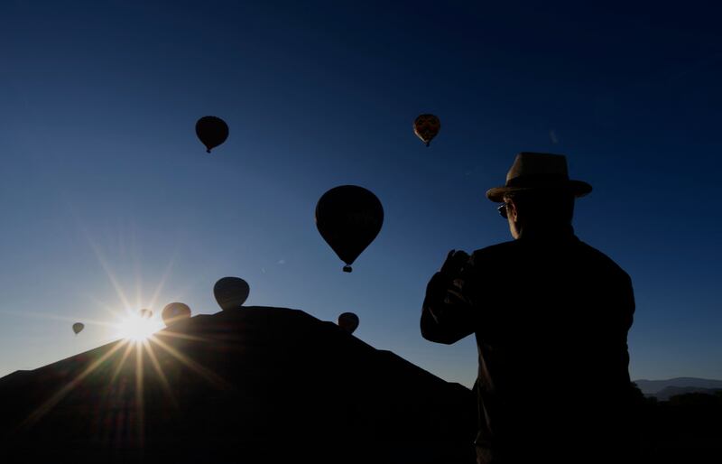 Hot air balloons over the Pyramid of the Sun during the spring equinox celebrations in the pre-hispanic city of Teotihuacan in Mexico City. AFP