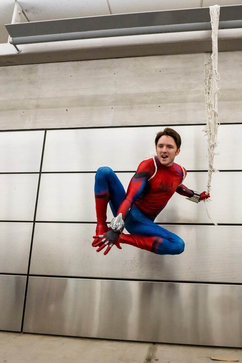 A Spider-Man cosplayer poses during New York Comic Con. Charles Sykes / Invision / AP