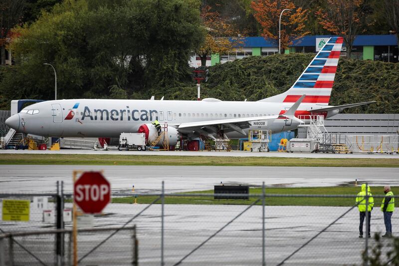 Boeing 737 MAX airliner with American Airlines markings is pictured on the ramp at Renton Airport adjacent to the Boeing Renton Factory in Renton, Washington on November 10, 2020. - Boeing said November 10, 2020 it was hit with another 12 cancelled orders for the 737 MAX, as the flagship aircraft is close to returning to the skies after being grounded since March 2019 following two deadly crashes. (Photo by Jason Redmond / AFP)