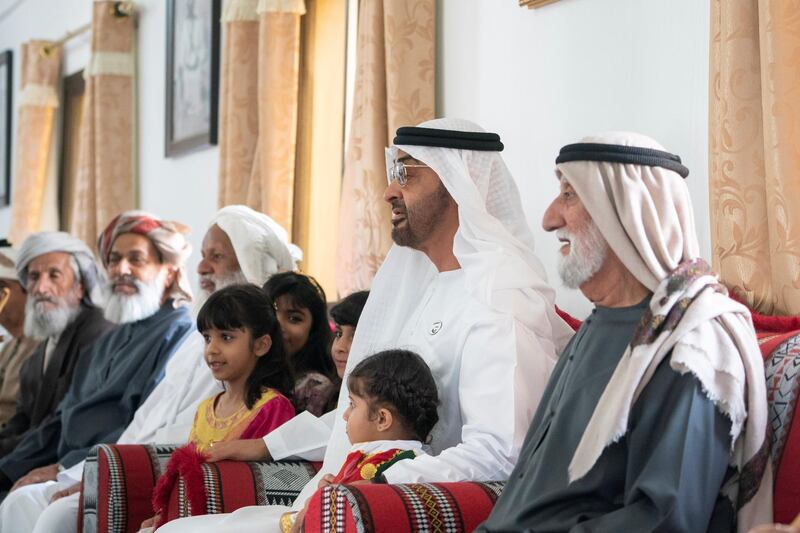 AL AIN, UNITED ARAB EMIRATES - January 19, 2019: HH Sheikh Mohamed bin Zayed Al Nahyan, Crown Prince of Abu Dhabi and Deputy Supreme Commander of the UAE Armed Forces (2nd R) visits the house of Matar Khalfan Al Neyadi (not shown). Seen with Hamad Rashid Mohamed Al Neyadi (R).

( Mohamed Al Hammadi / Ministry of Presidential Affairs )
---