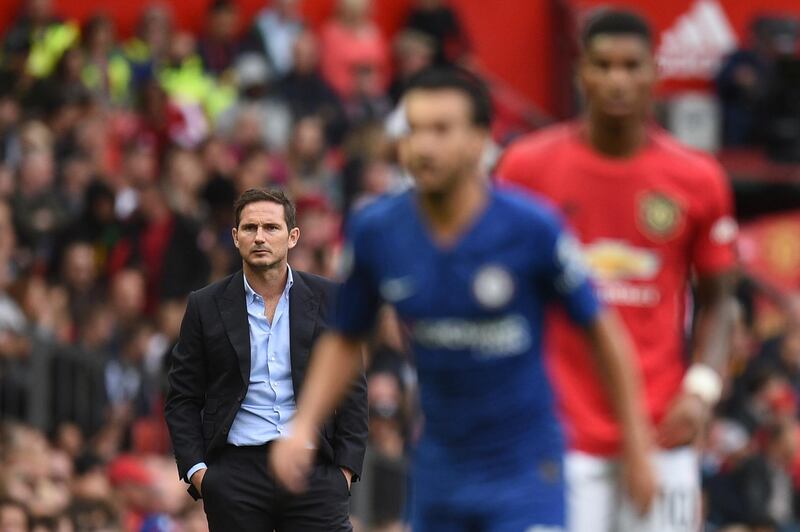 Chelsea's English head coach Frank Lampard watches from the touchline during the English Premier League football match between Manchester United and Chelsea at Old Trafford in Manchester, north west England, on August 11, 2019. (Photo by Oli SCARFF / AFP) / RESTRICTED TO EDITORIAL USE. No use with unauthorized audio, video, data, fixture lists, club/league logos or 'live' services. Online in-match use limited to 120 images. An additional 40 images may be used in extra time. No video emulation. Social media in-match use limited to 120 images. An additional 40 images may be used in extra time. No use in betting publications, games or single club/league/player publications. / 