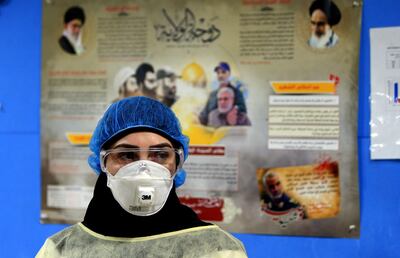 A picture taken during a guided tour organised by the Lebanese Shiite movement Hezbollah shows a nurse wearing protective clothing at a hospital in Beirut's southern suburb on March 31, 2020. / AFP / -
