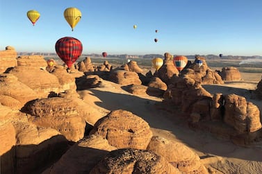 Saudi Arabia opens to tourists from around the world. Courtesy of Consulum  Balloons flying over the Unesco World Heritage Site of Al Ula.