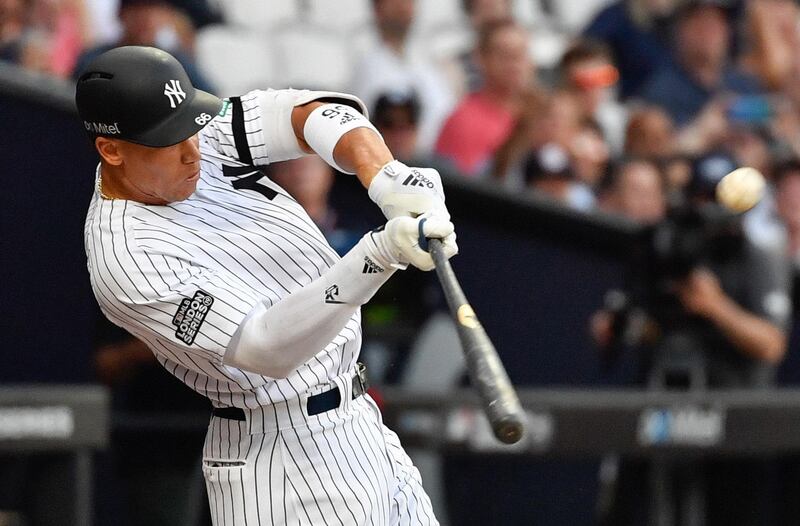 London, ENG; New York Yankees right fielder Aaron Judge (99) hits a two run home run during the fourth inning against the Boston Red Sox at London Stadium. Mandatory Credit: Steve Flynn-USA TODAY Sports