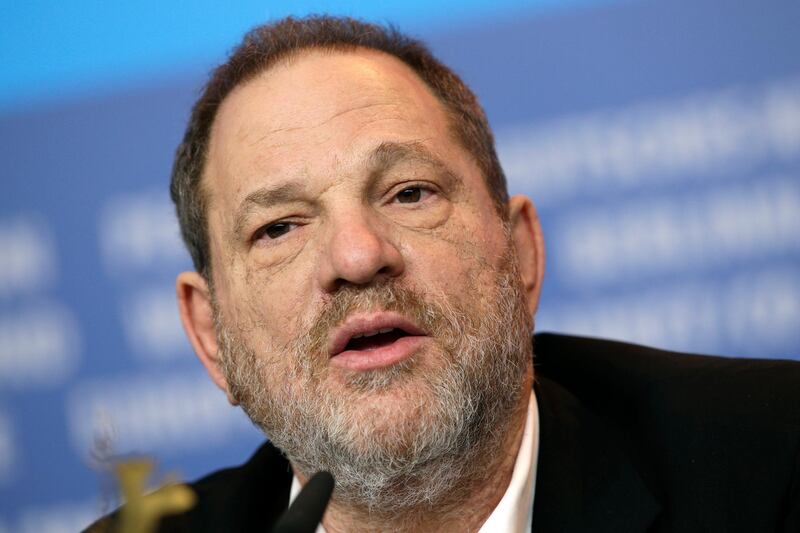 FILE- In this Feb. 9, 2015 file photo Harvey Weinstein speaks during a press conference for the film "Woman in Gold" at the 2015 Berlinale Film Festival in Berlin. Weinstein's former assistant Zelda Perkins said during an interview with The Associated Press Tuesday March 27, 2018, she tried to stop him abusing women two decades ago, making him sign a legal agreement that required him to seek therapy and mend his ways. (AP Photo/Michael Sohn, FILE)