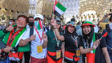 Expo visitors before the flag raising ceremony. Victor Besa / The National