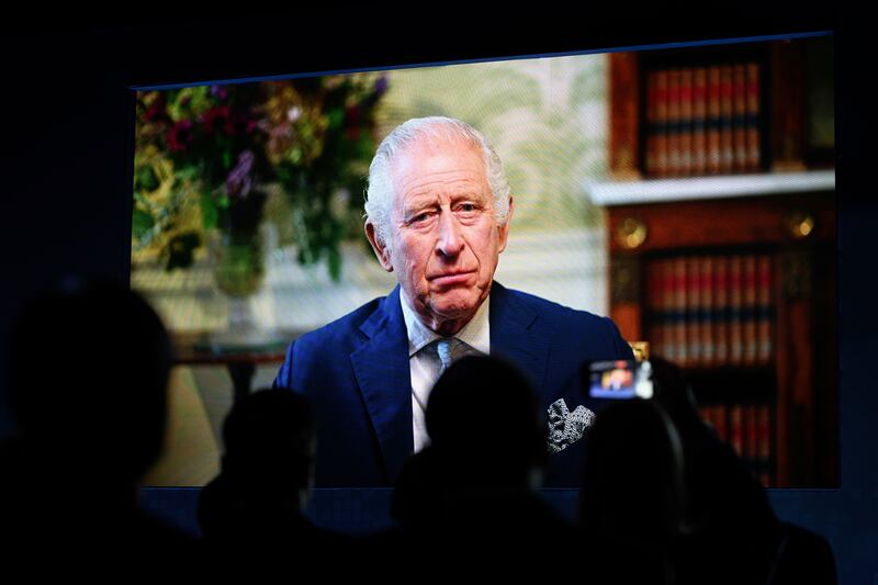 King Charles III addresses delegates in a recorded video message. AP