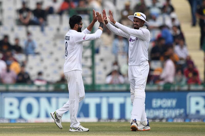 India's Ravindra Jadeja, left, celebrates with Shreyas Iyer after the dismissal of Sri Lanka's Suranga Lakmal. AFP