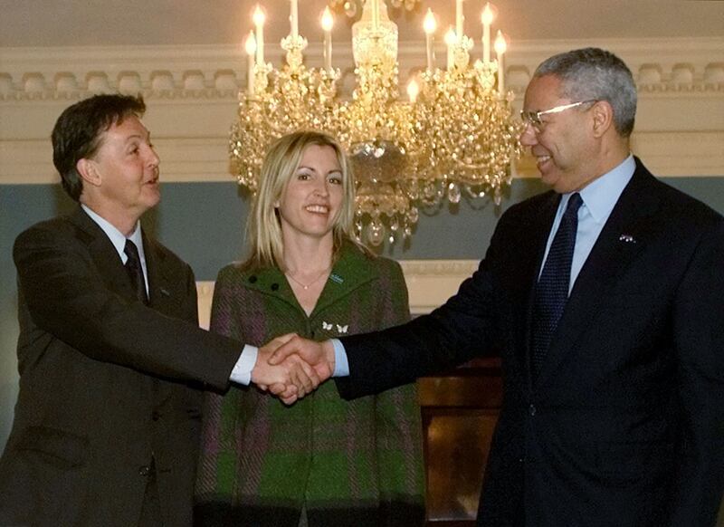 Powell greets musician Sir Paul McCartney and Heather Mills at the US State Department in Washington in April 2001. McCartney was voicing his concerns about the use of landmines. Reuters