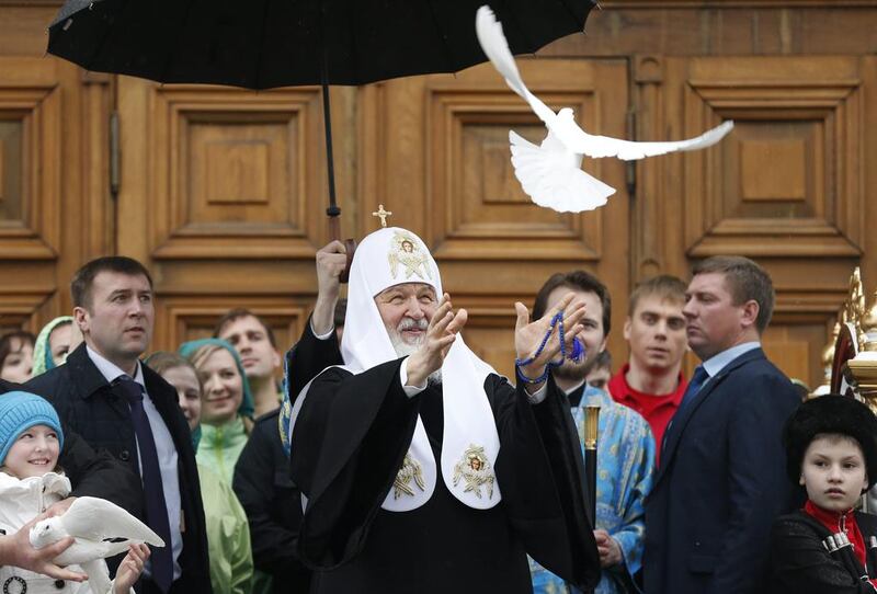 Russian Orthodox Patriarch Kirill, centre, releases a white dove to mark the Annunciation Day in the Kremlin in Moscow, Russia. Annunciation is one of twelve main holidays of Christianity and celebrates the Annunciation of the Blessed Virgin Maria by Archangel Gabriel. Yuri Kochetkov / EPA