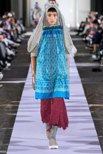 A cardigan becomes a snood at Andreas Kronthaler for Vivienne Westwood autumn/winter 2019. Supplied