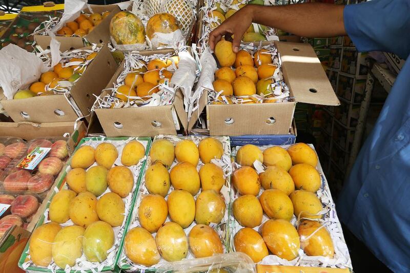 Indian mangoes at one of the fruit shop in Al Aweer Fruit and Vegetables Market in Dubai. Pawan Singh / The National
