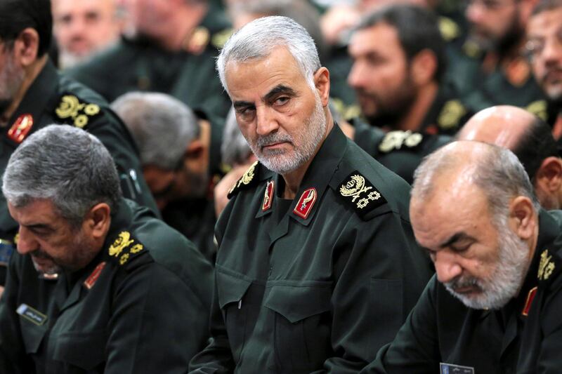 FILE - In this Sept. 18, 2016 file photo released by an official website of the office of the Iranian supreme leader, Revolutionary Guard Gen. Qassem Soleimani, center, attends a meeting with Supreme Leader Ayatollah Ali Khamenei and Revolutionary Guard commanders in Tehran, Iran. Iran's Revolutionary Guard is warning Islamic State militants that missile attacks launched into eastern Syria the previous day can be repeated if the extremists take action against Iran's security. (Office of the Iranian Supreme Leader via AP)